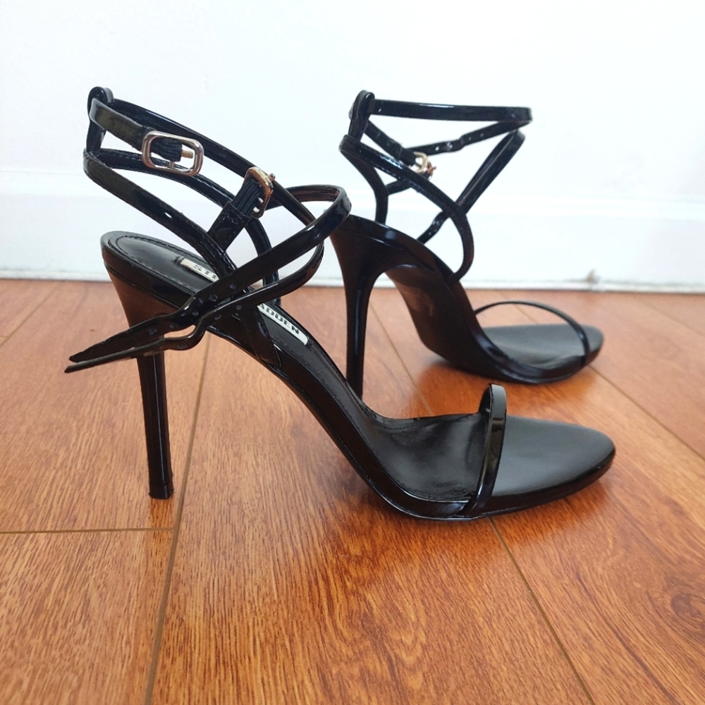 Strappy black shiny heels